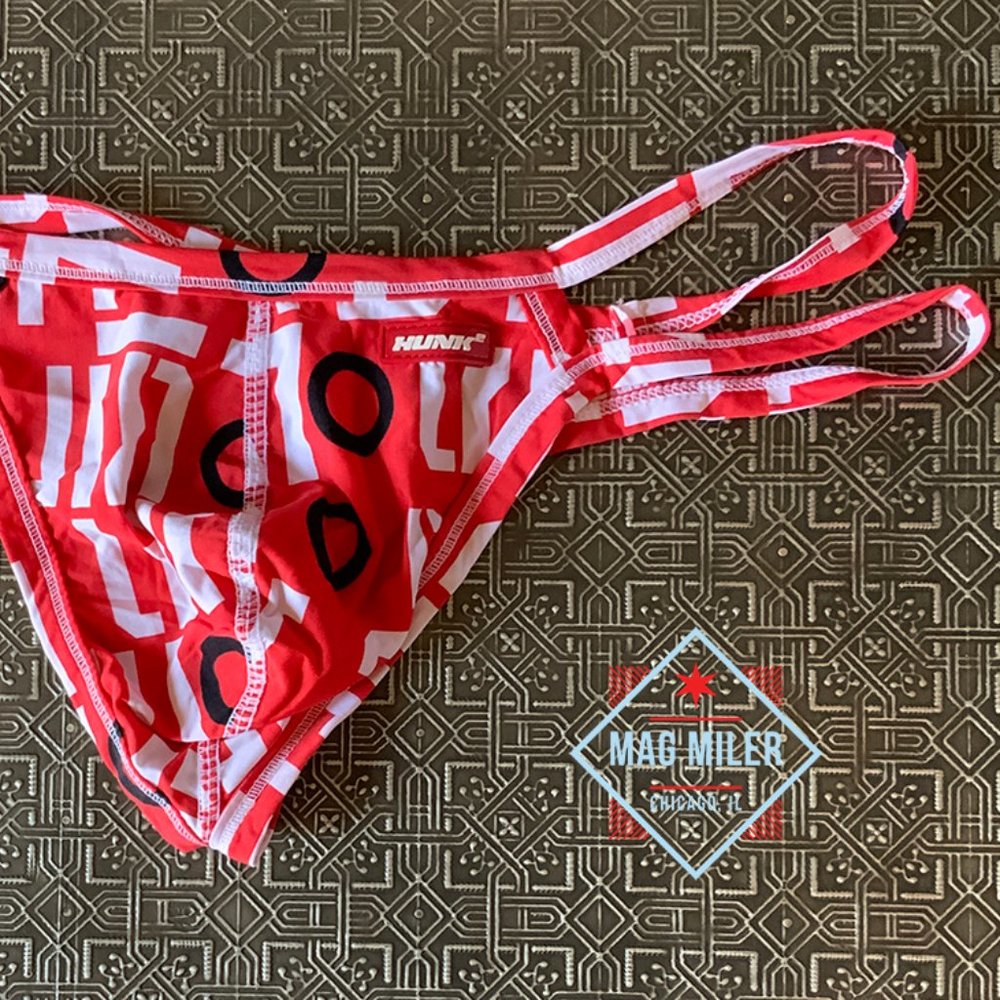 RED HUNK WORDART SPIDER THONG, MED